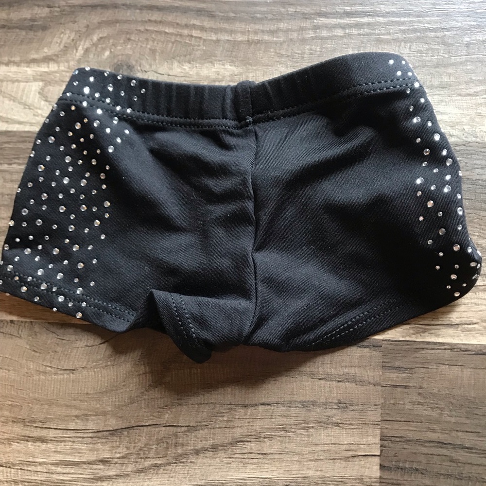Dance leotard and dance shorts.